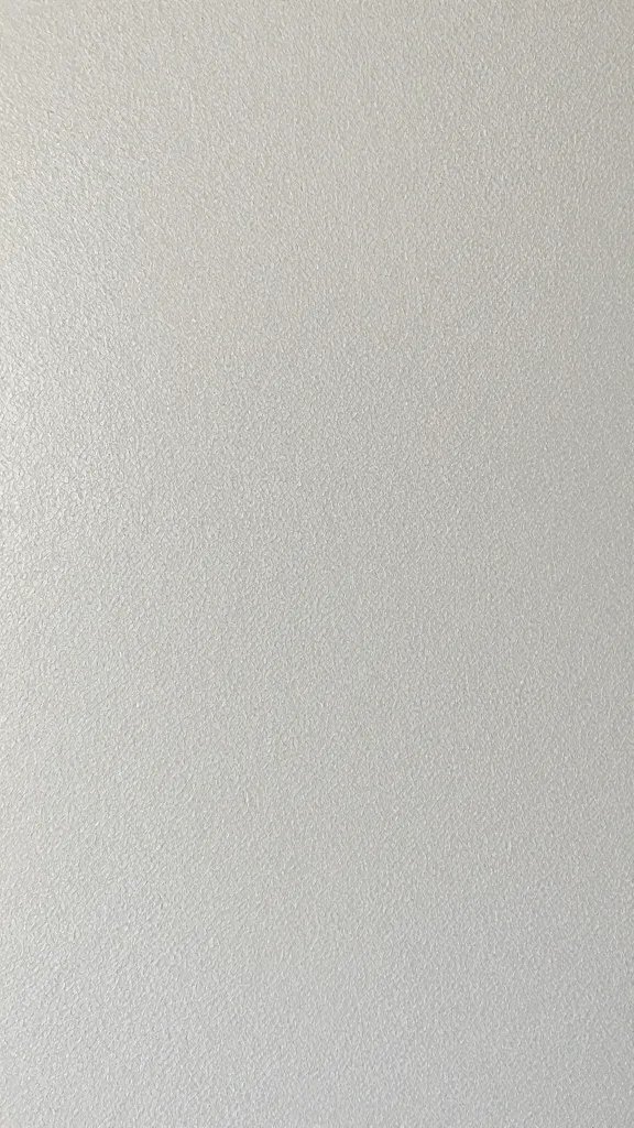 closeup of a single accent wall swatch on textured board